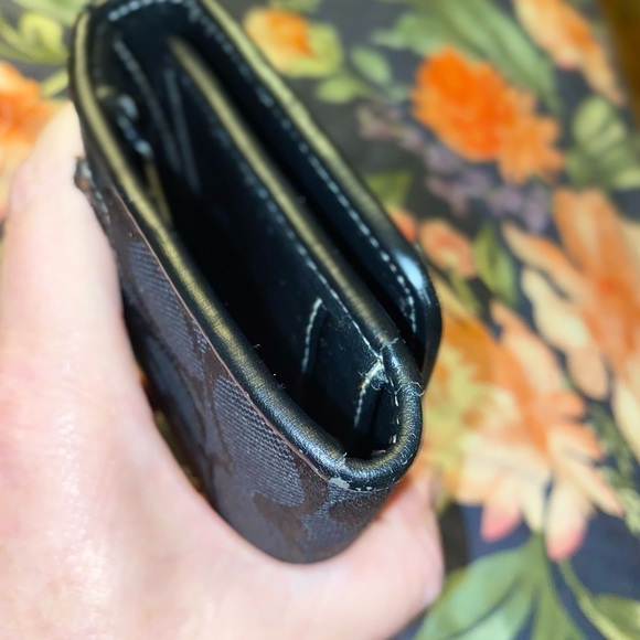 Coach trifold canvas black on tan with leather accents. - Picture 8 of 9